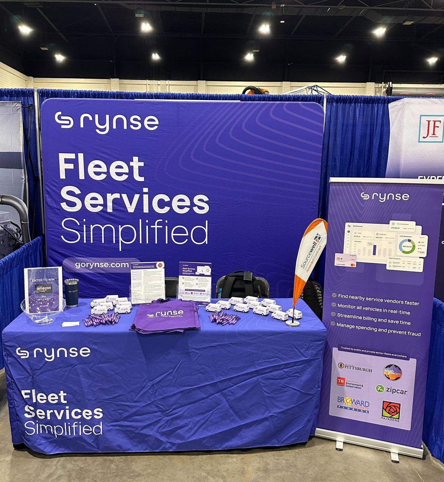 Rynse booth at the SGFMA 2025 Equipment Show, featuring branded signage and swag.